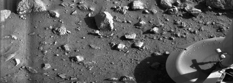 Taken by the Viking 1 lander shortly after it touched down on Mars, this image is the first photograph ever taken from the surface of Mars. It was taken on July 20, 1976.[61]