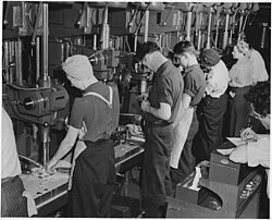Turning out parts for bomber planes at Willow Run, 1942