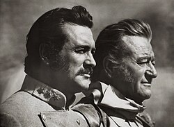 Hudson and John Wayne (right) in The Undefeated (1969)