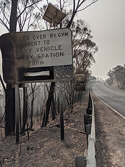 Damaged road signs along Bells Line of Road
