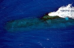 HMAS Rankin, a Collins-class submarine at periscope depth