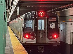 R179 train stops at Forest Hills-71 Av Station.