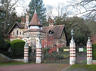 The entrance and gatehouse at Harrison's Friar Park estate in Henley-on-Thames. In December 1999, he and his wife Olivia were the victims of a knife attack by an intruder.
