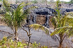 Lava from the Puʻu ʻŌʻō cinder cone has flowed 14 miles into the town of Pāhoa. The lava has breached the boundary of the Pāhoa Transfer Station.