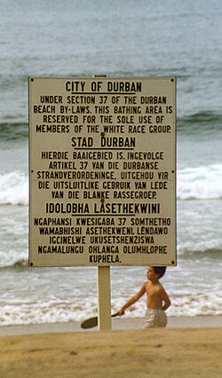 A sign on a racially segregated beach during Apartheid in South Africa, stating that the area is for the "sole use of members of the white race group"