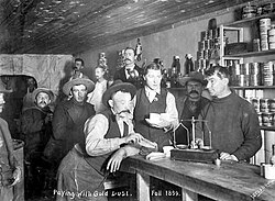 Paying with gold dust, 1899