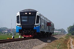 KA Jenggala train of Greater Surabaya Commuter Line passing by Sidoarjo station. This train serves the easternmost rail route in East Java specially in Greater Surabaya