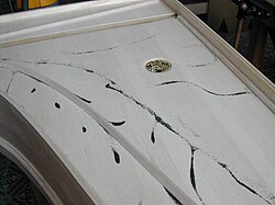 Sound board of a harpsichord with Chladni patterns