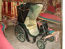 An old polocart displayed at City Palace, Jaipur. The museum also displays a "night polo ball" with a rotating platform on which a candle is placed.[105]