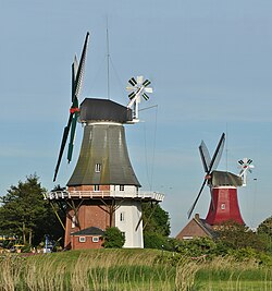Two smock mills with a stage in Greetsiel, Germany