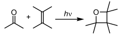 In this Paterno–Büchi reaction, a photoexcited carbonyl group is added to an unexcited olefin, yielding an oxetane.