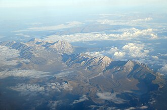 Gran Sasso d'Italia massif seen from an airplane. Part of the Apennine Mountains, it is located in the Abruzzo region of Italy.