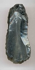 This obsidian scraper found at Spiro Mounds, Oklahoma, was sourced from Pachuca, Mexico; an example of vast Pre-Columbian trade networks.
