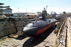 The US Navy Los Angeles-class USS Greeneville in dry dock, showing cigar-shaped hull