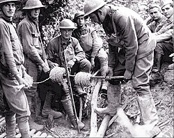 American soldiers during World War I laying barbed wire. June, 1918