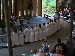 Representing a continuous tradition of the Finnish Awakening, youth are confirmed at Paavo Ruotsalainen's homestead in Nilsiä, Finland.