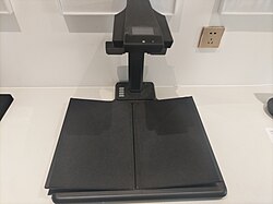 The CZUR M3000 book scanner features a V-shaped cradle that protects books during scanning, ensuring their preservation.