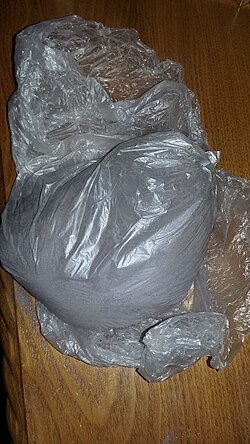 Cremated ashes still in plastic bag