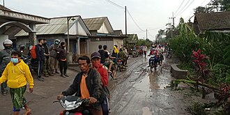 Villagers in Lumajang evacuating to a safe distance from the volcano.