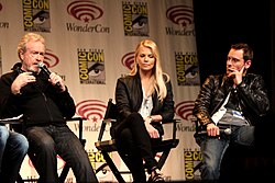 Scott speaking with Prometheus stars Charlize Theron and Michael Fassbender at Wondercon 2012 in Anaheim, California on 17 March 2012