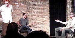 Three improvisers performing longform improv comedy at the Gorilla Tango Theatre in Chicago.