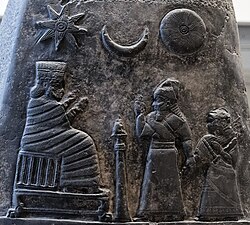 Symbols representing Sin (center), Ishtar (left) and Shamash (right), as depicted on the upper half of a kudurru of Meli-Shipak II.