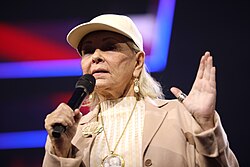 Barr speaking with attendees at the 2023 AmericaFest in Phoenix
