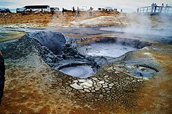 Mudpots lined up above a volcanic fissure at Hverarönd, Iceland