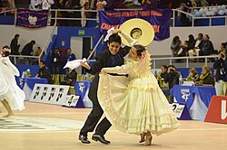 A couple dancing marinera in a competition in Miraflores, Lima, Peru