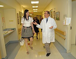 Davis and Gallin walking in a hospital hall