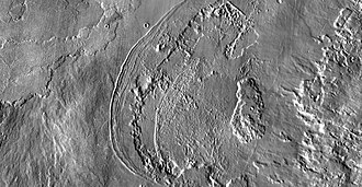 THEMIS IR daytime mosaic of fan-shaped deposit at western edge of Ascraeus Mons. The deposits are believed to be glacial moraines formed by mountain glaciers.