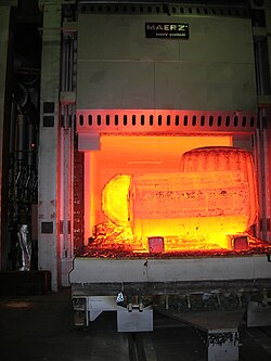 Industrial furnace in operation, equipped with high-temperature mineral wool