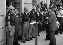 Stand in the Schoolhouse Door: Governor George Wallace attempts to block the enrollment of black students at the University of Alabama.