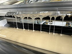 This image shows aerospace-grade epoxy resin used in prepreg manufacturing
