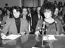 Congresswoman Nancy Pelosi (left) with Taylor (right), who is testifying in 1990 before the House Budget Committee on HIV-AIDS Funding
