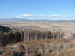Valley of Palakaria River springing from Vitosha Mountain, seen in the background, in Bulgaria