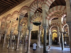 A section of the hypostyle hall in the Mosque–Cathedral of Córdoba, begun in 785