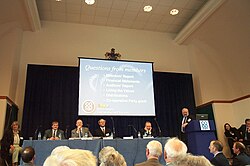 The volunteer board of a retail consumer cooperative, such as the former Oxford, Swindon & Gloucester Co-op, is held to account at an annual general meeting of members.