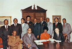 Stokes (standing, fourth from right) with fellow founding members of the Congressional Black Caucus in 1971