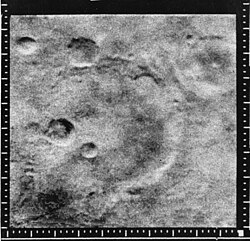 Mariner Crater, as seen by Mariner 4. The location is Phaethontis quadrangle.
