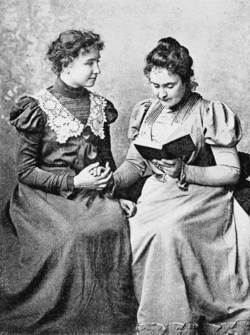 Helen Keller (left) in 1899 with lifelong companion and teacher Anne Sullivan (right). Photo taken by Alexander Graham Bell at his School of Vocal Physiology and Mechanics of Speech.