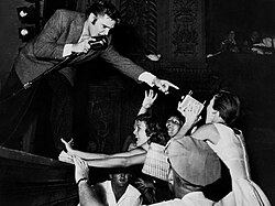Presley performing live at the Olympia Theater in Miami, August 3, 1956
