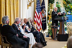 President Joe Biden giving a speech to the 2021 honorees Justino Díaz, Lorne Michaels, Bette Midler, Berry Gordy, and Joni Mitchell