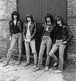 Punk rock spearheads the Ramones wearing distressed jeans.