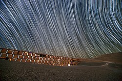 Star trails caused by the Earth's rotation during the camera's long exposure time[8]