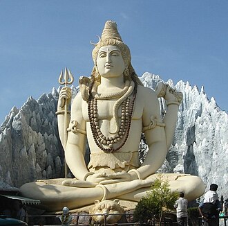 Statue of Shiva performing yoga in the lotus position