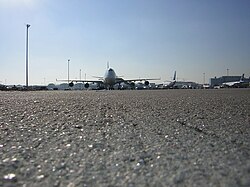 An airport taxiway, one of the uses of asphalt concrete