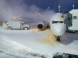 Deicing an aircraft during a snow event