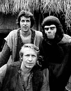 McDowall in full costume, with co-stars Ron Harper (front) and James Naughton (back), in the Planet of the Apes TV series (1974)