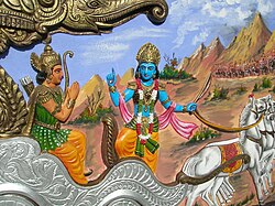 House decoration of Krishna speaking to Arjuna